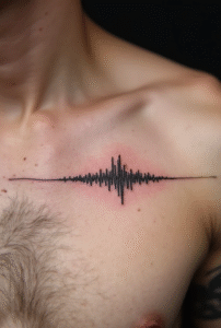 “Minimal sound-wave line tattoo on the upper male chest, created with a thin continuous black line representing a meaningful sound.”